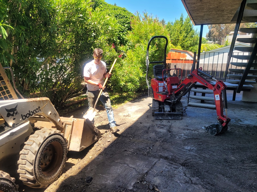 Thornton Paving excavation equipment preparing a paved area